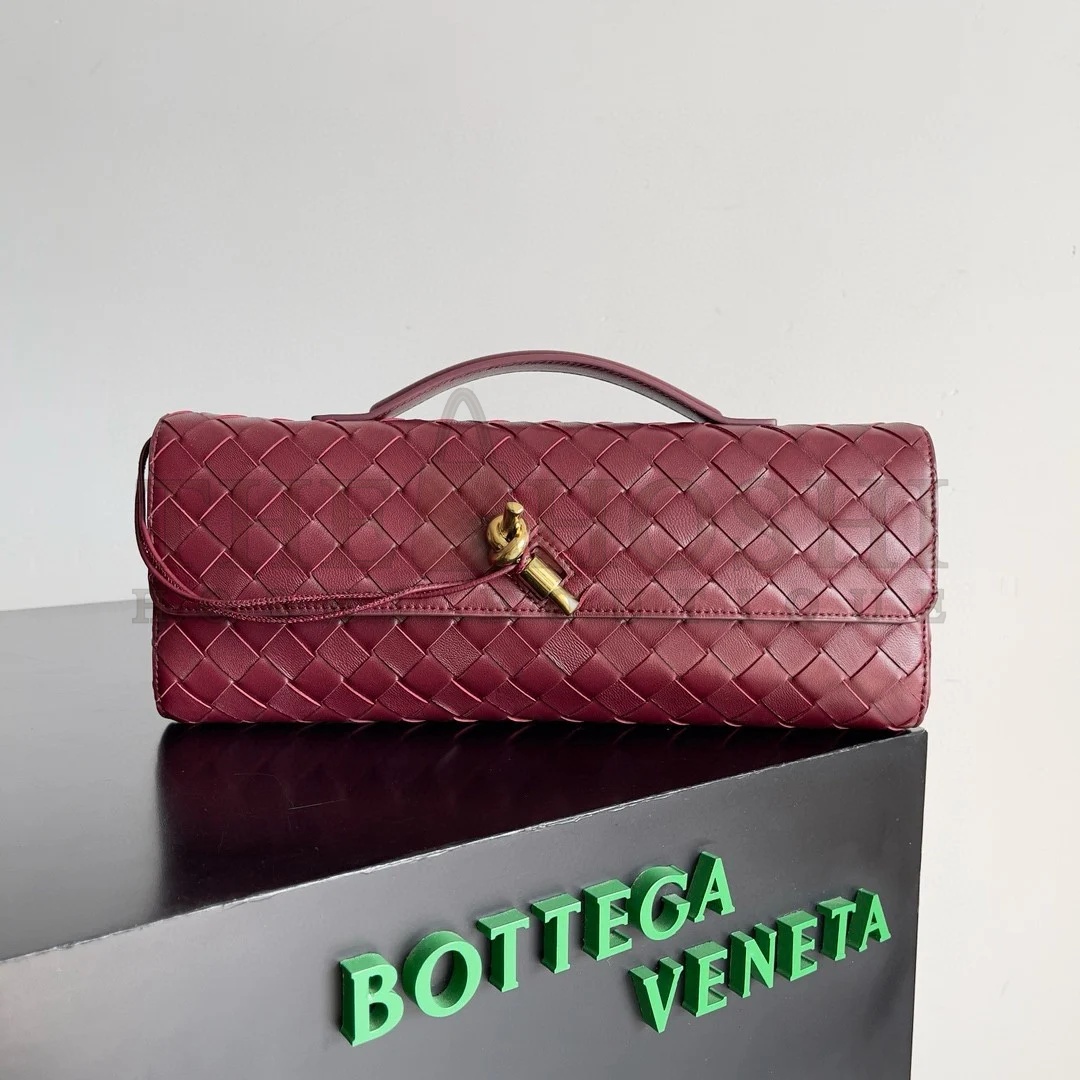 B0tt*ga Ven*ta Andiamo Clutch with Handle in Barolo Intrecciato Lambskin Master Quality